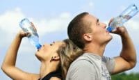 How much water should I drink each day ?
